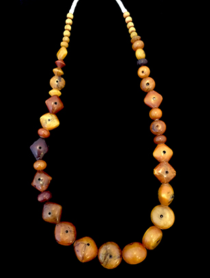 Strand of Carved Shell Bead Caps from Mali